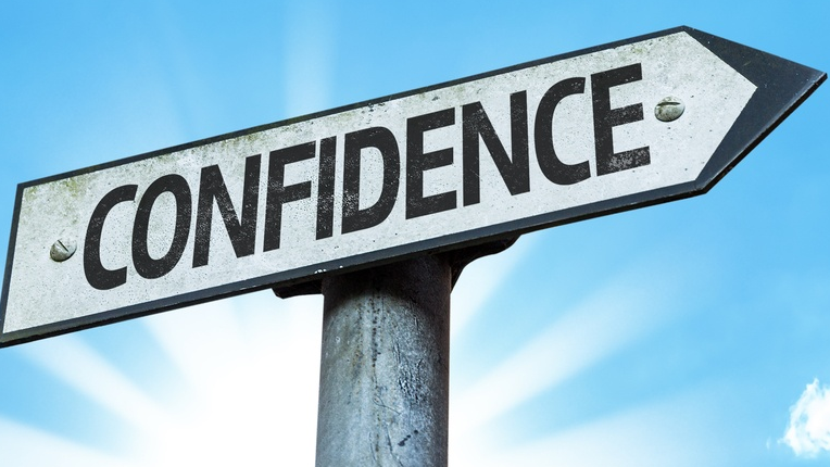 An image of sign post with confidence written on it.