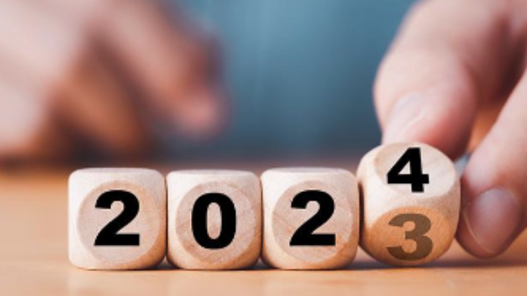 Four dice showing 2023 turning into 2024.